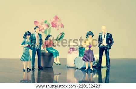 miniature family people with retro filter concept family business