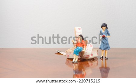 Miniature woman and tape measure concept diet weight