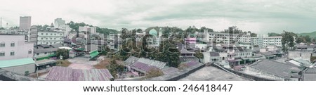panorama old public small town view from building rooftop, at betong thailand.with retro filter