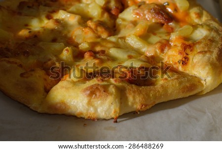Pizza food on cook paper board with lighting shadow