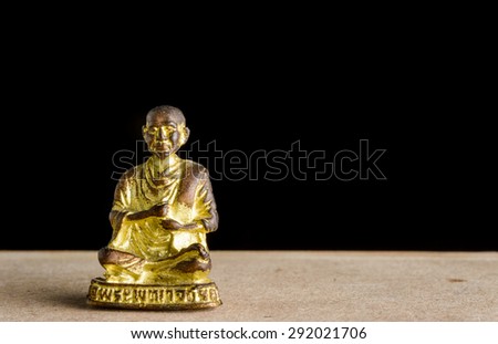 close up old small buddha amulets of Buddhism religion