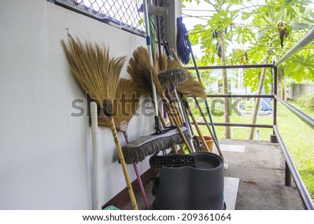broom and mop cleaning  equipment on the balcony
