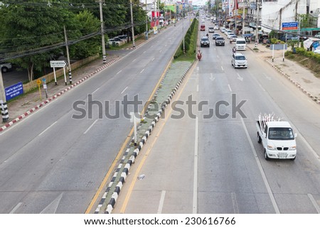 CHIANGMAI - OCTOBER 5, 2014: bird eye view of traffic in non rush hour in Chiangmai, Thailand on October 5, 2014.
