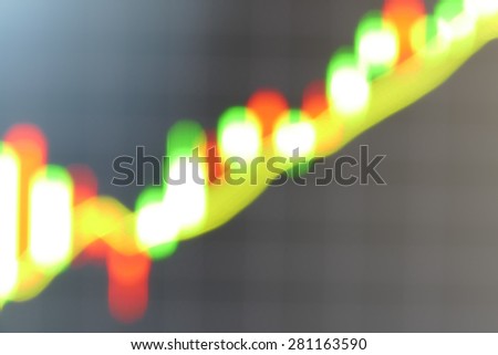 blurry defocused image of graph on computer screen for use as abstract background