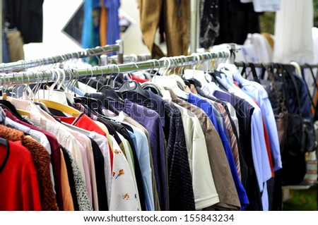 Clothes On A Rack In A Flea Market