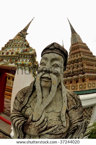 Guardian statue (yak) at the temple Wat pho, one of the major tourist attractions in Bangkok, Thailand