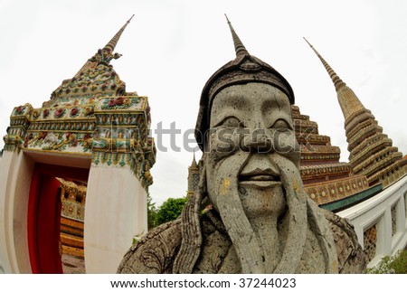 Guardian statue (yak) at the temple Wat pho, one of the major tourist attractions in Bangkok, Thailand