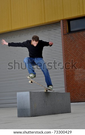 young man enjoys skateboarding in the streets.