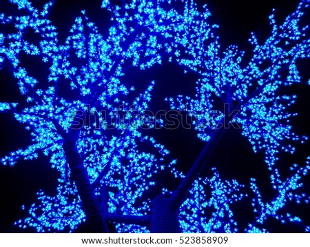 The blue Christmas tree lighting.Festive tree.LED Branch Lights, LED Tree Lights, Christmas Lights