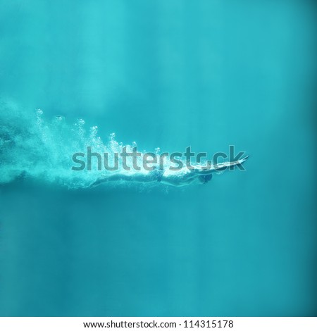 professional swimmer underwater after the jump in abyss