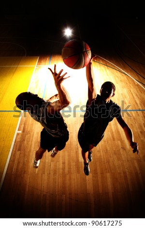 Basketball jump - dark silhouettes
