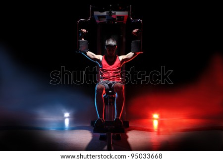 man training on gym isolated on black background