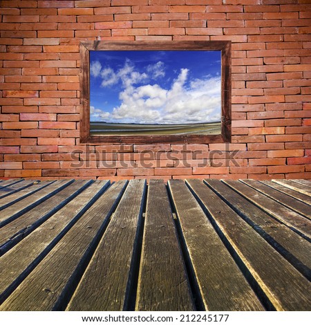 Sea view through an open brick wall  in a the  room