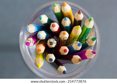 crayon in the glass In white background