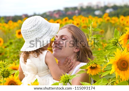happy young woman holds the  child