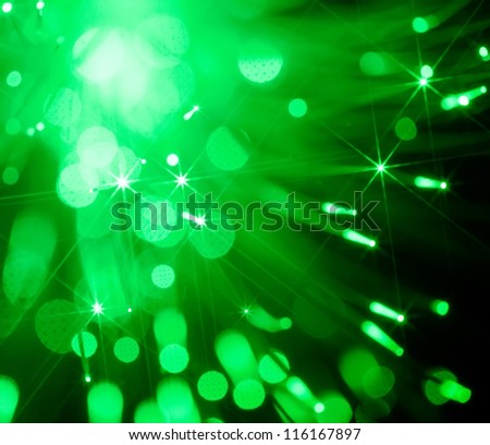 abstract background of  green optical fiber spot lights