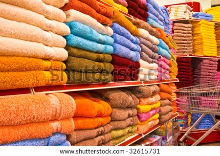 Colour terry towels in textile shop