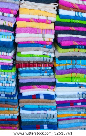 Colour terry towels in textile shop