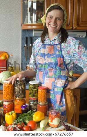Happy housewife. House conservation of vegetables.