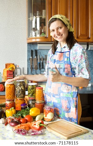 Happy housewife. House conservation of vegetables.