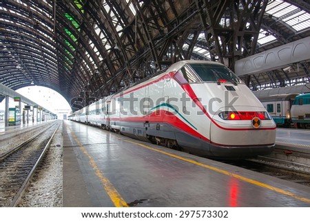 ITALY, MILAN-MAI 7,2014: The modern high-speed train at the station. The central railway station of Milan (ital. Milano Centrale) is one of the largest stations of Europe