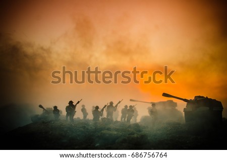 War Concept. Military silhouettes fighting scene on war fog sky background, World War Soldiers Silhouettes Below Cloudy Skyline At night. Attack scene. Armored vehicles. Tanks battle. Decoration