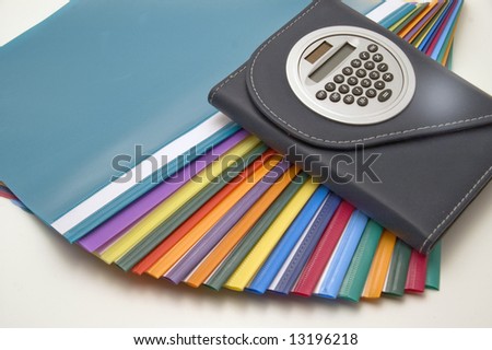 Color files, notebook on white background.