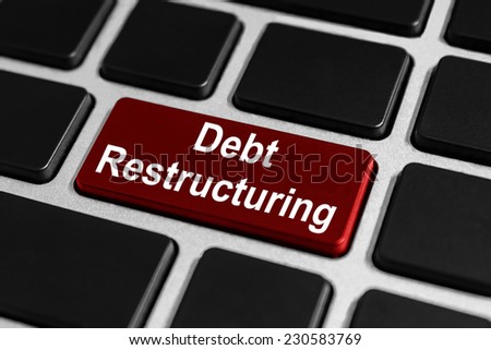 debt restructuring red button on keyboard, business concept