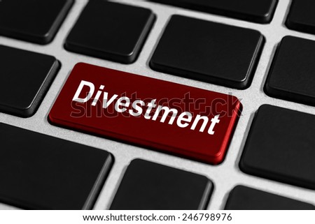 divestment red button on keyboard, business concept