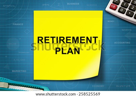 Retirement plan text on yellow note with graph paper