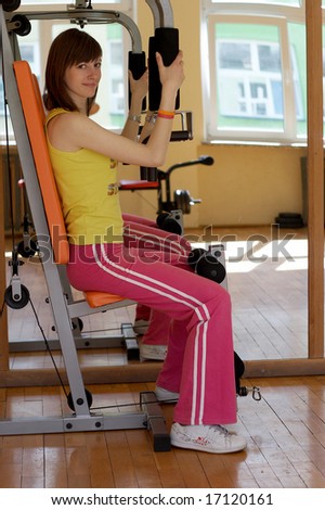 A young woman in a health club