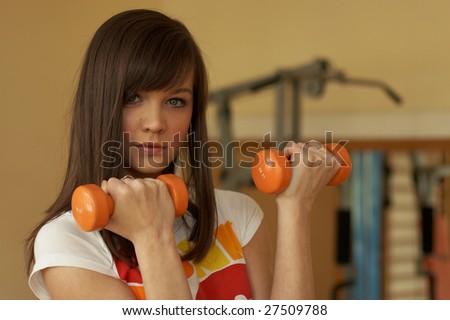 A young girl in the gym