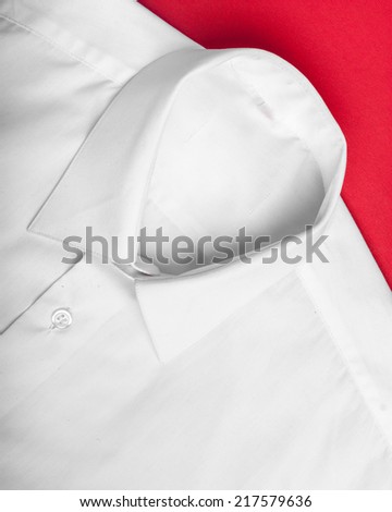 Fold white long sleeves shirt. studio shot