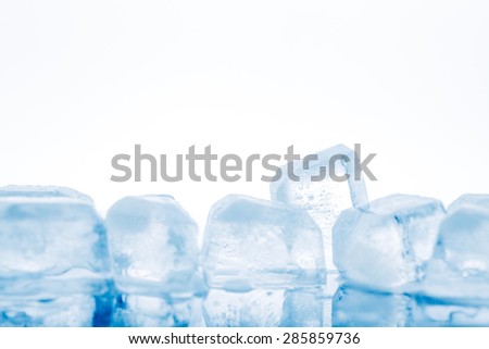 ice cube on white background with reflection