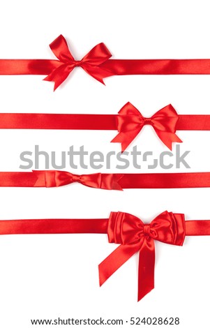 set of red ribbon satin bows isolated on white