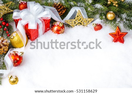 Christmas gift with decoration on white background