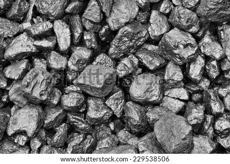 Coal mine deposit mineral black cube stone after the rain
