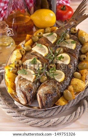 Freshly prepared fish with vegetables added