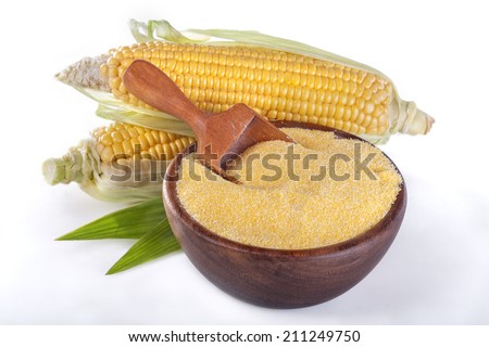 corn with grits polenta in a wooden bowl on white