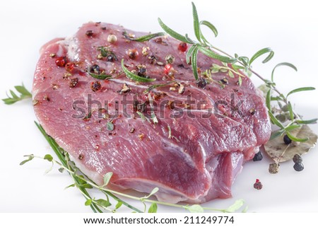 Fresh meat with pepper, mint, rosemary, thyme and spices