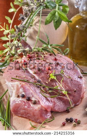 Fresh meat with pepper, mint, rosemary, thyme and spices