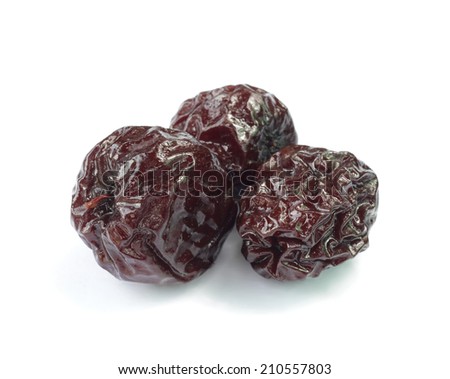 Dried plums isolated on white background