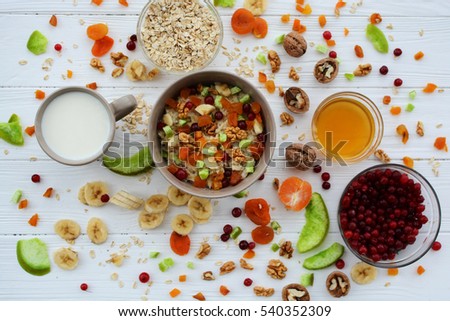 Healthy eating. Oatmeal with fruit and candied fruit