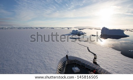 Ship Breaking Ice in Antarctica