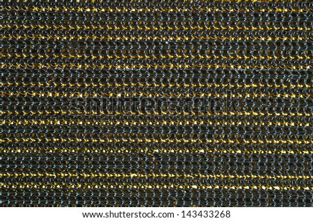 Dark striped fabric with gold lines