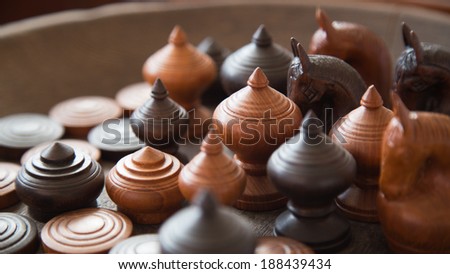 Group of ancient Thai wooden chess with natural lighting, Home decoration