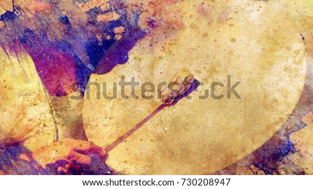 shamanic girl with frame drum on abstract structured background.