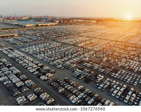 Aerial view a lot of car for import and export shipping by ship.