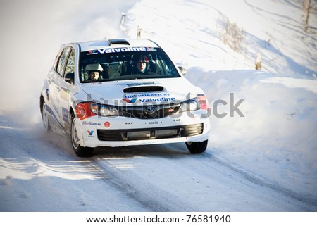 HAGFORS, SWEDEN - FEB 10: Anders Grondal drivning his Subaru during the World Rally Championship event Rally Sweden in Hagfors, Sweden on Feb 10, 2011
