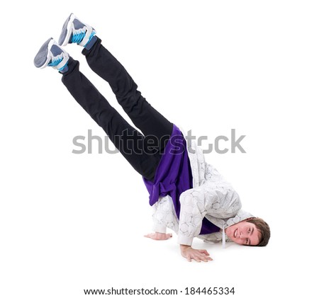 Teenage break dance boy doing a handstand
